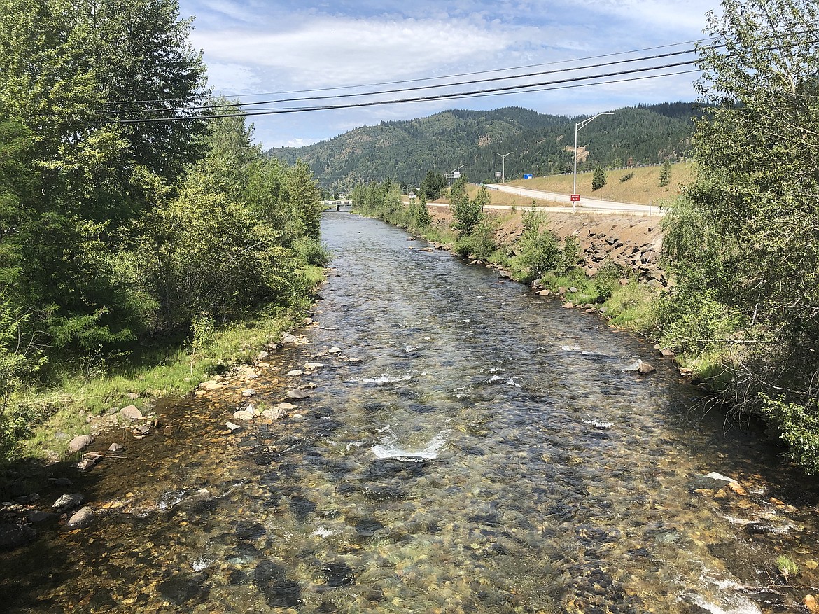 Photo by JOSH McDONALD/ The South Fork of the Coeur d’Alene River as it runs through a channel in the middle of Kellogg. According to unverified numbers from the U.S. Army Corps of Engineers, the channel would be more than deep enough to handle a potential 100-year flood, which should allow homeowners in the area to no longer have to pay expensive flood insurance if the numbers get verified.