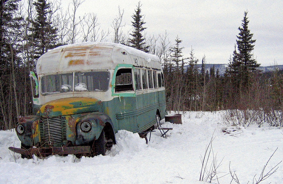 FILE - This March 21, 2006 file photo, shows the abandoned bus where Christopher McCandless starved to death in 1992 on Stampede Road near Healy, Alaska. State officials say the abandoned bus in Alaska's backcountry that was popularized by the book "Into the Wild" and movie of the same name has been removed Thursday, June 18, 2020.(AP Photo/Jillian Rogers, File )