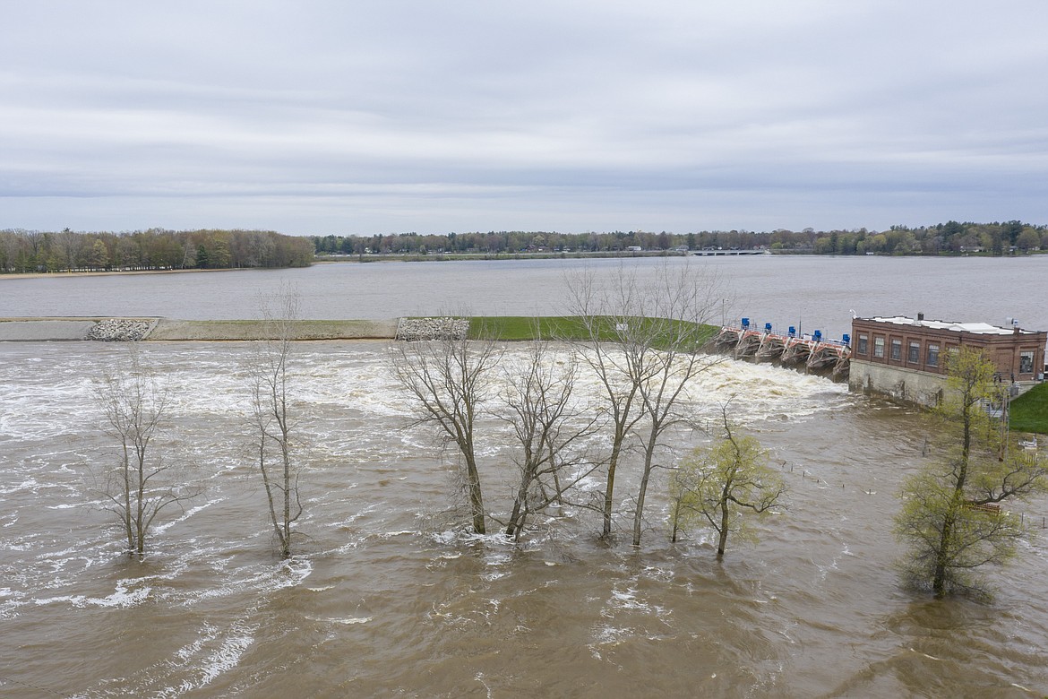 A view of the flooded area near the Sanford Dam on Tuesday, May 19, 2020. Residents were told to evacuate due to the dams on Sanford and Wixom Lakes no longer being able to control or contain the amount of water flowing through the spill gates. (Kaytie Boomer/MLive.com/The Bay City Times via AP)