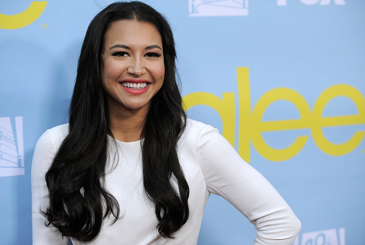 FILE - Naya Rivera, a cast member in the television series "Glee," poses at a screening and Q&A for the show, at the Academy of Television Arts and Sciences in Los Angeles on May 1, 2012. Authorities say a body has been found at a Southern California lake during the search for “Glee” star Naya Rivera. The Ventura County Sheriff’s Office says in a tweet that the body was found Monday morning, July 13, 2020, in the search of Lake Piru for Rivera, five days after her 4-year-old son was found alone in a boat the two had rented. (AP Photo/Chris Pizzello, File)