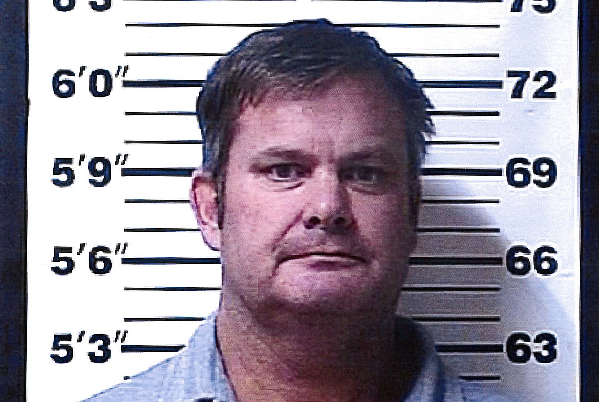 A booking photo provided by the Rexburg (Idaho) Police Department shows Chad Daybell, who was arrested Tuesday, June 9, 2020, on suspicion of concealing or destroying evidence after local and federal investigators searched his property, according to the Fremont County Sheriff’s Office. Authorities said they uncovered human remains at Daybell's home Tuesday as they investigated the disappearance of his new wife's two children — a case that's drawn global attention for its ties to two other mysterious deaths and the couple's doomsday beliefs. (Rexburg Police Department via AP)