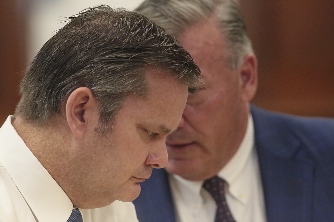 Chad Daybell, left, confers with defense attorney John Prior during a preliminary hearing in St. Anthony, Idaho, on Monday, August 3, 2020. The preliminary hearing will help a judge decide if the charges against Chad Daybell will move forward in state court. Daybell, 52, is charged with concealing evidence by destroying or hiding the bodies of 7-year-old Joshua "JJ" Vallow and 17-year-old Tylee Ryan at his eastern Idaho home. (John Roark/Post Register via AP, Pool)