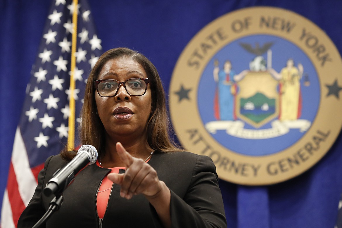 New York State Attorney General Letitia James takes a question after announcing that the state is suing the National Rifle Association during a press conference, Thursday, Aug. 6, 2020, in New York. James said that the state is seeking to put the powerful gun advocacy organization out of business over allegations that high-ranking executives diverted millions of dollars for lavish personal trips, no-show contracts for associates and other questionable expenditures. (AP Photo/Kathy Willens)