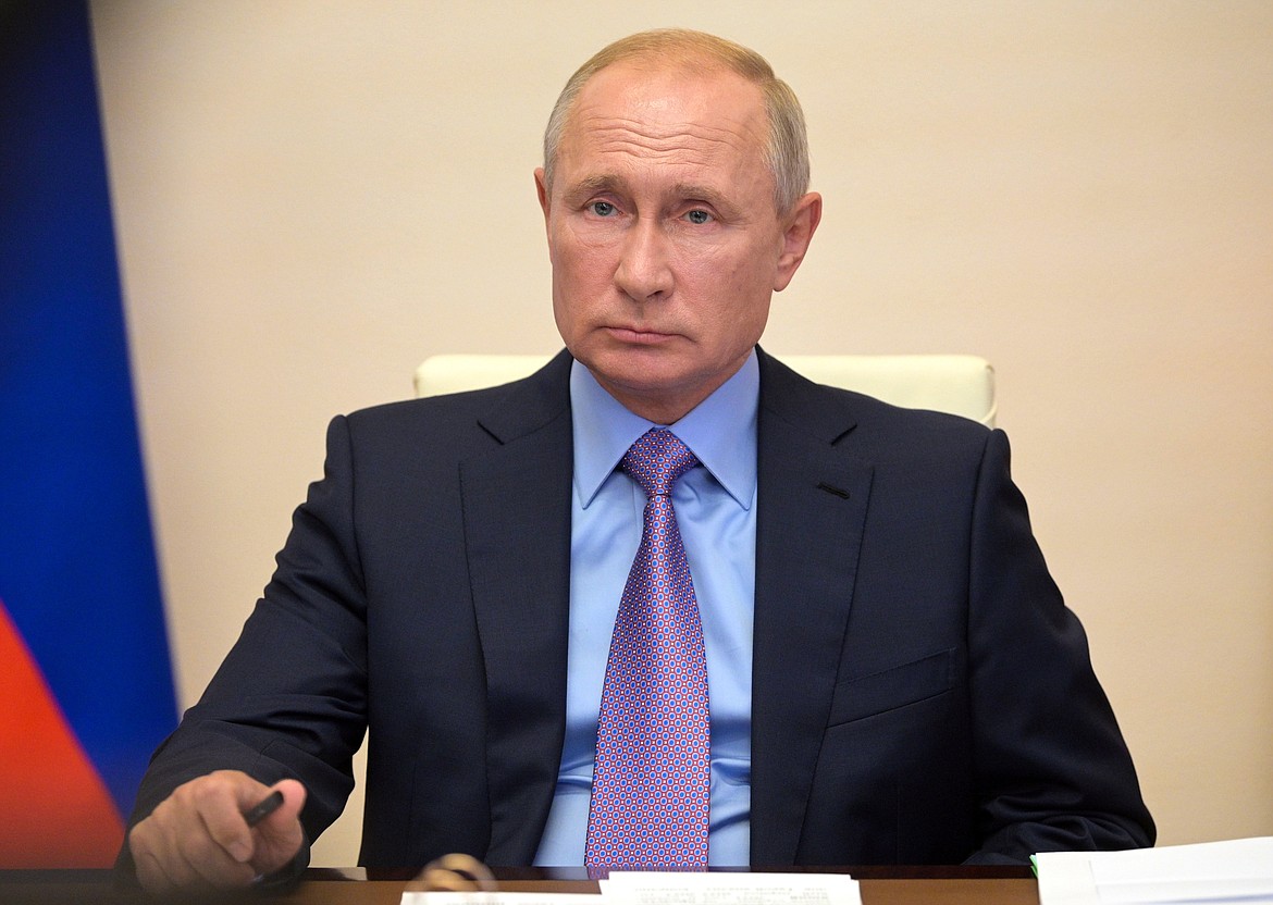 Russian President Vladimir Putin leads a cabinet meeting via video conference at the Novo-Ogaryovo residence outside Moscow, Russia, Thursday, July 16, 2020. (Alexei Druzhinin, Sputnik, Kremlin Pool Photo via AP)