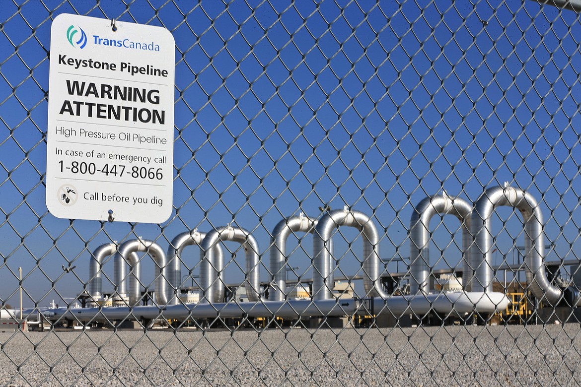 FILE - This Nov. 3, 2015 file photo shows the Keystone Steele City pumping station, into which the planned Keystone XL pipeline is to connect to, in Steele City, Neb. Pipeline sponsor TC Energy says it has started preliminary work along its route through the U.S. as opponents wait for a judge to rule on their request to block the project. (AP Photo/Nati Harnik, File)