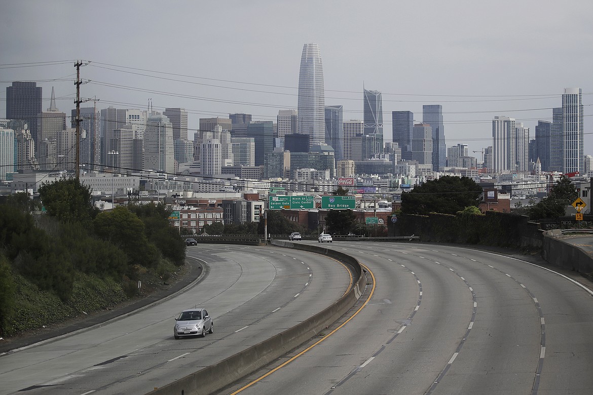 Light traffic is seen on Highway 101 in San Francisco, Sunday, March 29, 2020, amid coronavirus concerns. (AP Photo/Jeff Chiu)