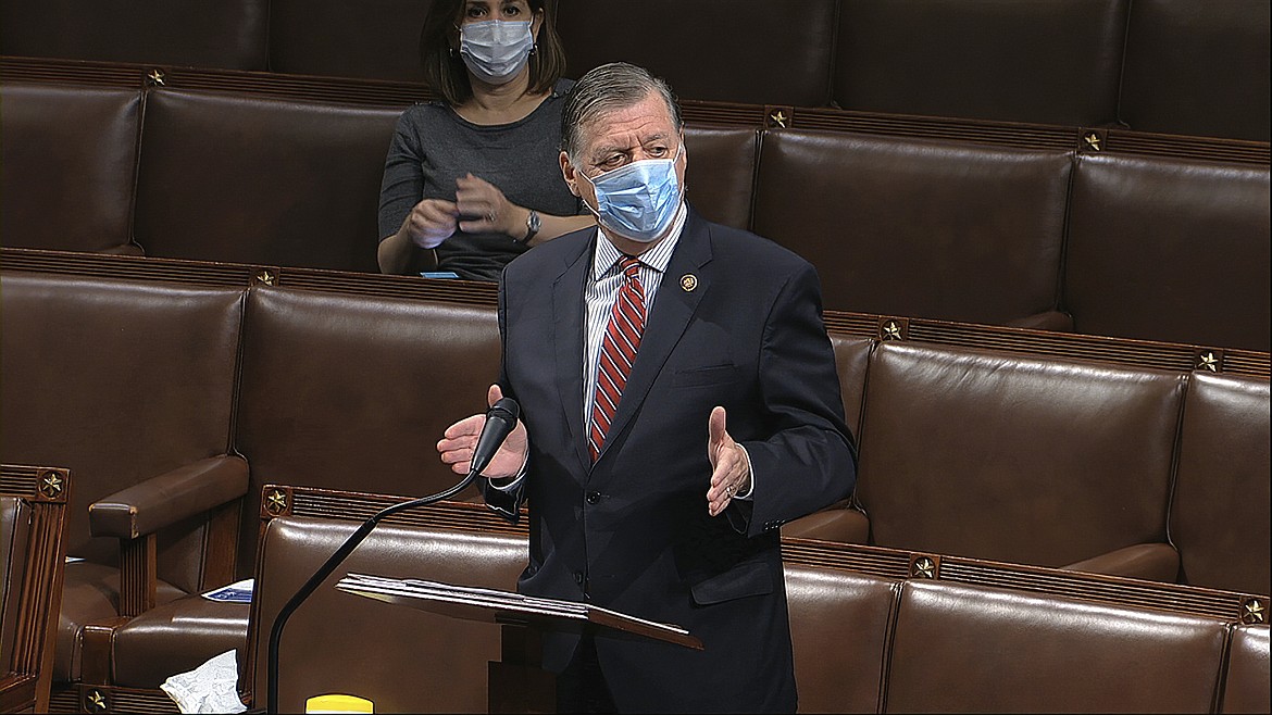 In this image from video, Rep. Tom Cole, R-Okla., speaks on the floor of the House of Representatives at the U.S. Capitol in Washington, Thursday, April 23, 2020. (House Television via AP)