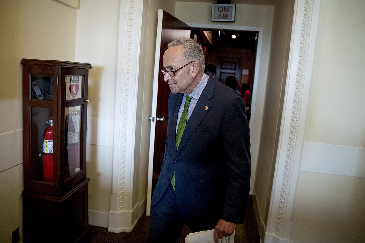 Senate Minority Leader Sen. Chuck Schumer of N.Y. departs a news conference on Capitol Hill in Washington, Tuesday, June 9, 2020. (AP Photo/Andrew Harnik)