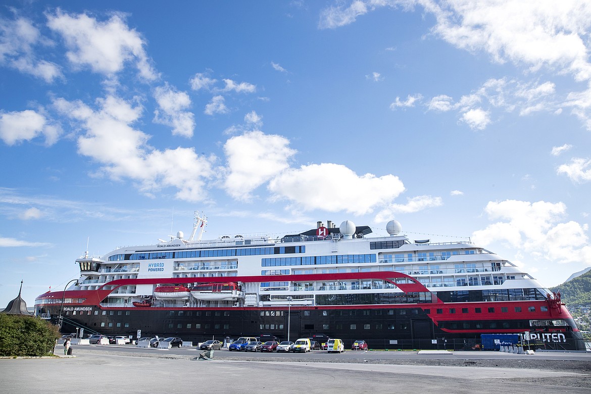 A view of the Hurtigruten's vessel MS Roald Amundsen, docked in Tromso, Norway, Sunday, Aug. 2, 2020. Over 30 crew members and an unconfirmed number of passengers have so far tested positive for the coronavirus after two international cruises which resumed operation recently, since the outbreak of the coronavirus pandemic. (Terje Pedersen/NTB scanpix via AP)