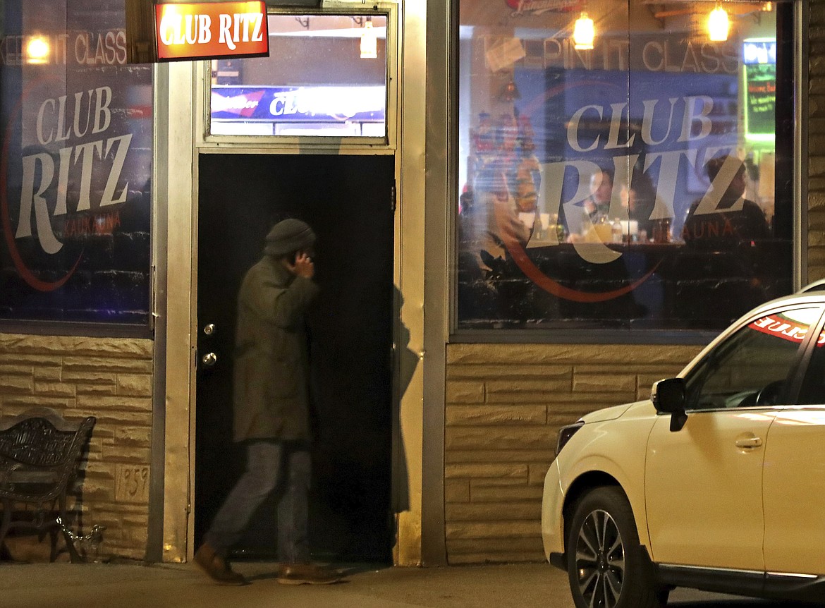 Club Ritz opens to patrons following the Wisconsin Supreme Court's decision to strike down Gov. Tony Evers' stay-at-home restrictions, Wednesday, May 13, 2020, in Kaukauna, Wis. (William Glasheen/The Post-Crescent via AP)