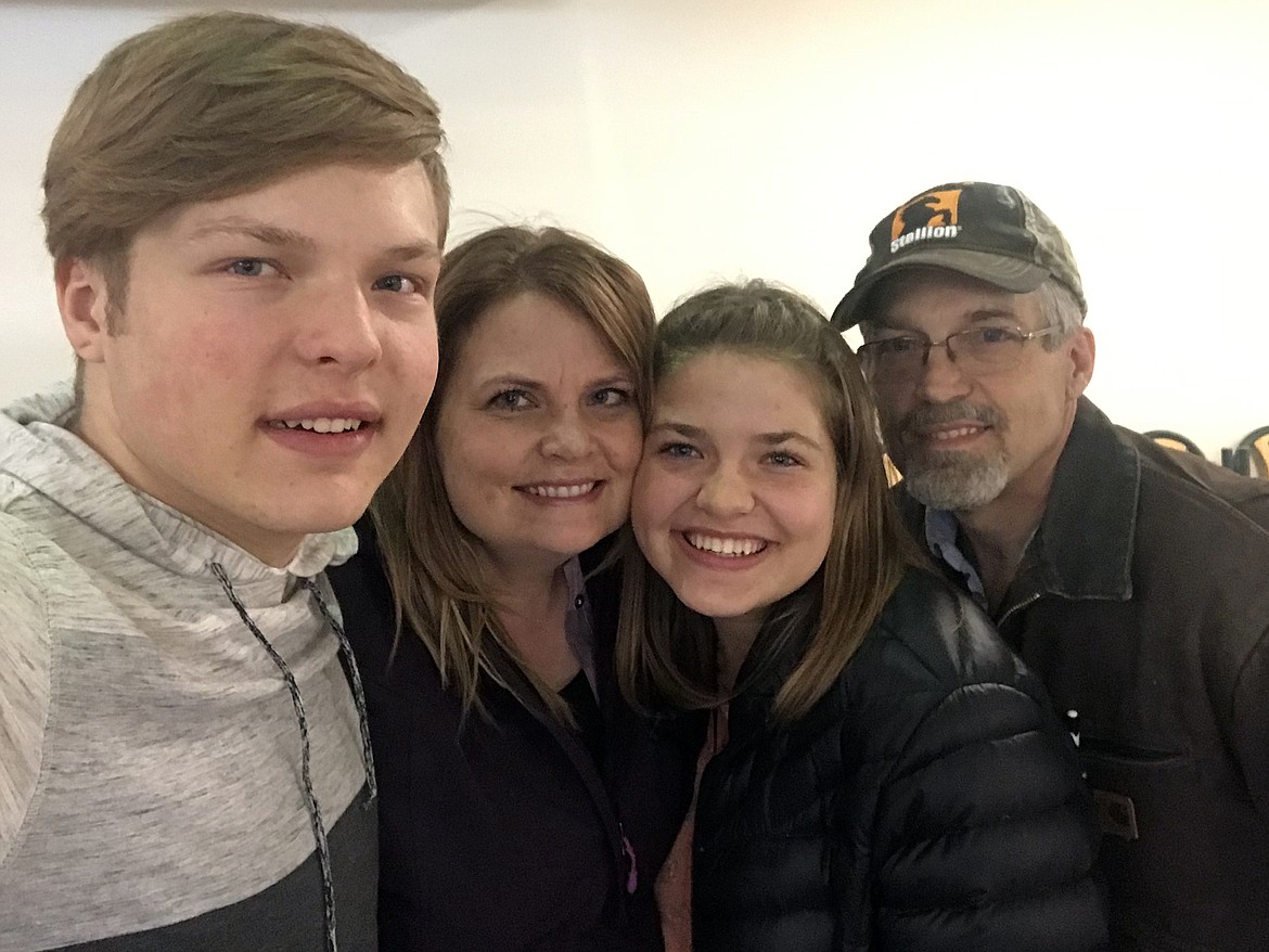 The Sample family, from left, Jalen, Nanette, Brooke and David celebrate at the Glacier International Airport after Brooke’s return from Peru March 31. (photo provided)