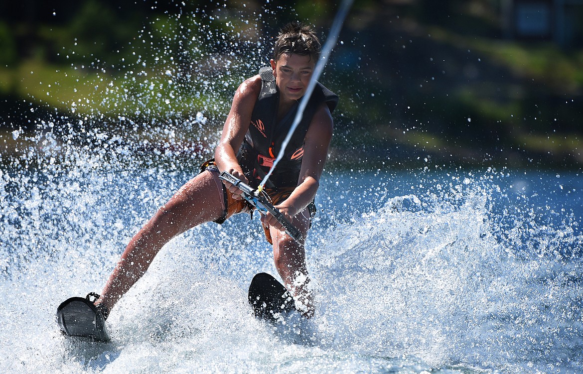 First time water skier Ashten Nelson of Kalispell get his legs underneath him during his recent lesson with Flathead Wakeboard Academy. (Jeremy Weber/Bigfork Eagle)