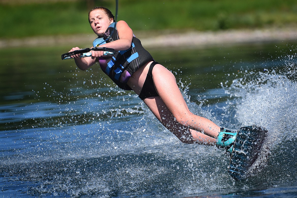 Kalispell's Kellyn Nelson enjoys her first time wakboarding this season with Flathead Wakeboard Academy on Echo Lake. (Jeremy Weber/Bigfork Eagle)