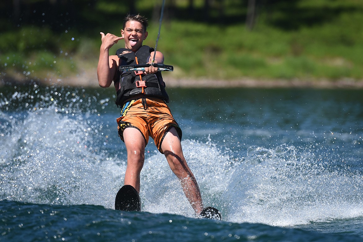 Kalispell's Ashten Nelson shows his enthusiasm during his first time waterskiing with Flathead Wakeboard Academy. (Jeremy Weber/Bigfork Eagle)