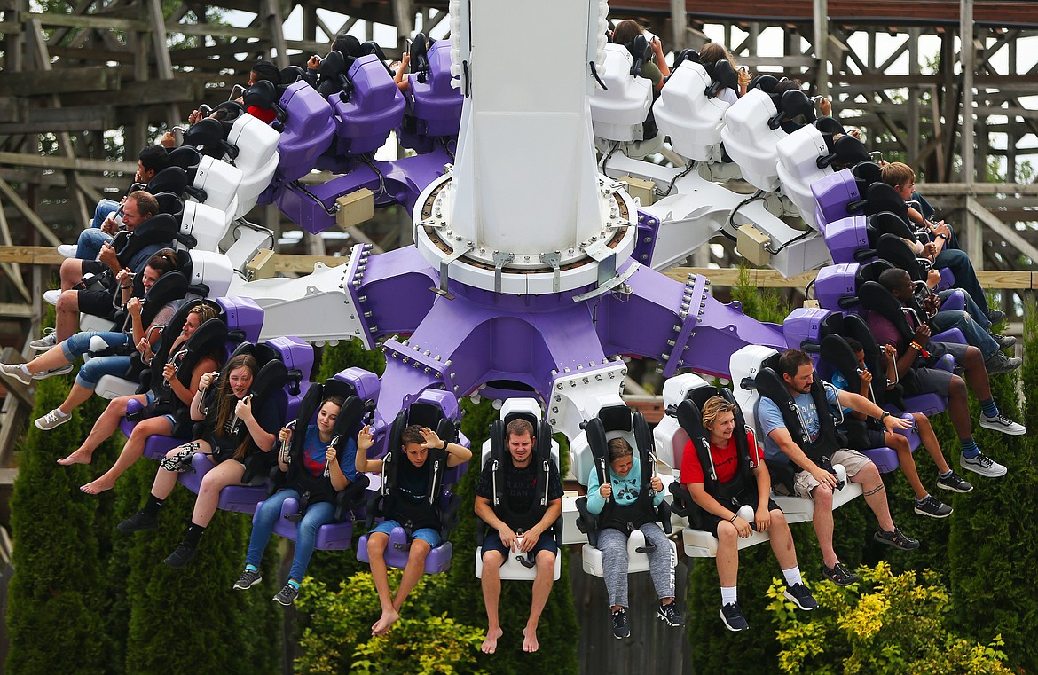 Park guests go for a spin on Spincycle at Silverwood Theme Park in 2018. This season will look a little different because of coronavirus restrictions. Marketing and communications director Jordan Carter said he expects shorter lines as fewer people will be allowed into the park each day.