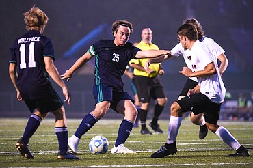 Glacier's Braden Nitschelm (25) scores in the first half against Flathead during crosstown soccer at Legends Stadium on Tuesday. (Casey Kreider/Daily Inter Lake)
