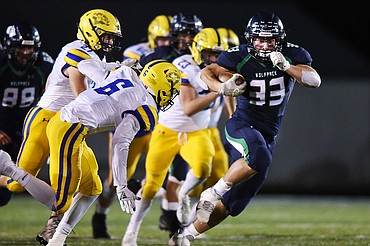 Glacier running back Jake Rendina (33) breaks loose on a 42-yard run in the third quarter against Missoula Big Sky at Legends Stadium on Friday. (Casey Kreider/Daily Inter Lake)