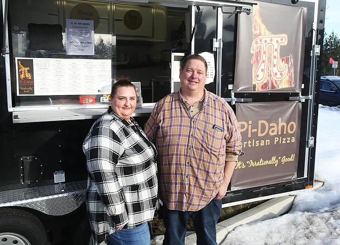 Jeff Rowley, co-owner of Pi-Daho Artisan Pizza with his wife, LeeAnn, pose for a portrait. The food truck is located next to Post Falls Brewing Company. Jeff got his start when his brother Greg, a local Realtor, invited him to make pizzas for a real estate open house. “I have always been a fan of making food. It’s a lot of fun,” Rowley said.