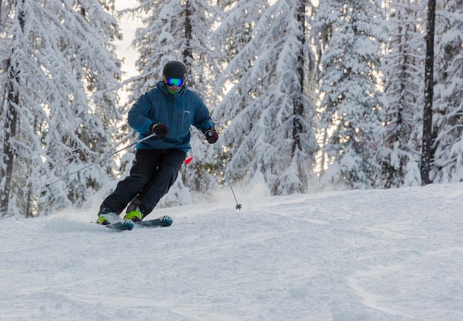 Bob Ambrose, of Kalispell, Mont., carves a turn down Lookout’s Golden Eagle slope in November.