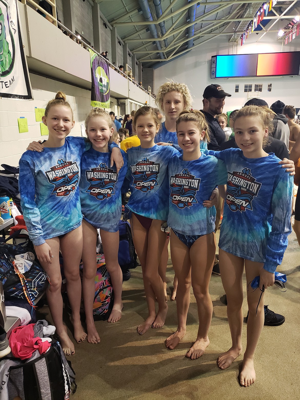Manta Ray Aquatics competed at the Washington Open Swim Meet in Federal Way. Pictured left to right: Makhaela Parrish, Issabelle Parrish, Julia Heaps, Melody Lake, Kathryn Duvall. Cole Lindberg is pictured in the back.
