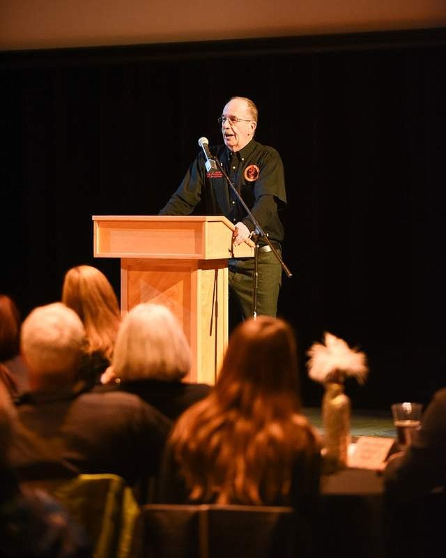 Fred Hamilton of the VFW Lion Mountain Post 276 accepts the award for Business of the Year at the Whitefish Chamber's annual awards banquet last Thursday.