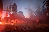 Apartment building catches fire, again