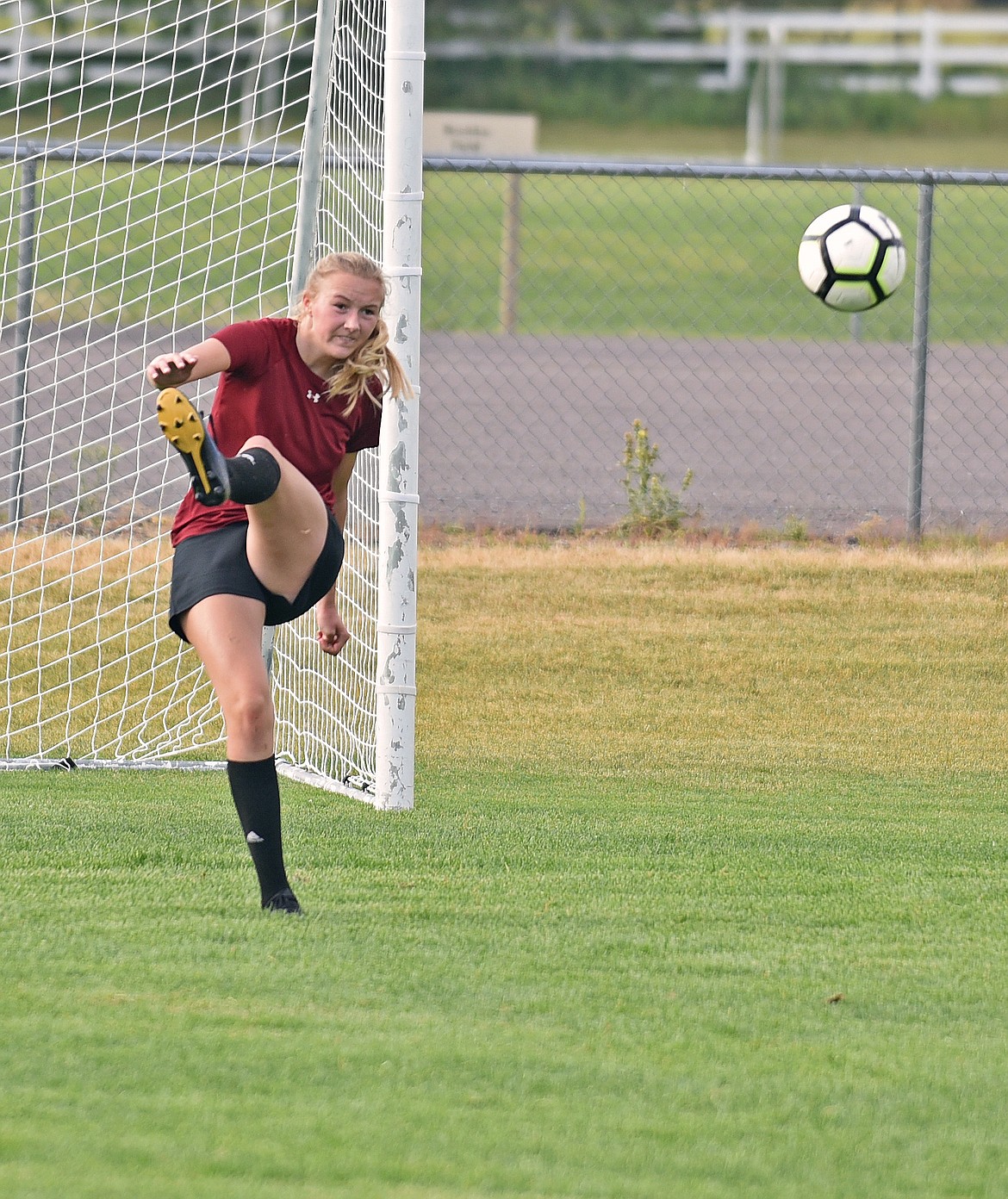 Whitefish Lady Bulldog goalkeeper Sami Galbraith kicks a long ball during a fit test at practice on Aug. 20 at Smith Fields. (Whitney England/Whitefish Pilot)