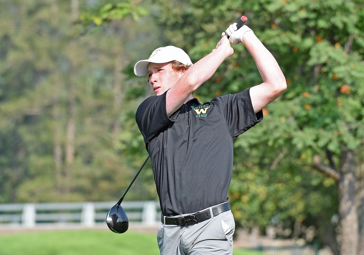 Whitefish High School golfer and defending Class A state champion Cameron Kahle watches his shot at the Whitefish Invitational on the south course of the Whitefish Lake Golf Course. (Whitney England/Whitefish Pilot file)