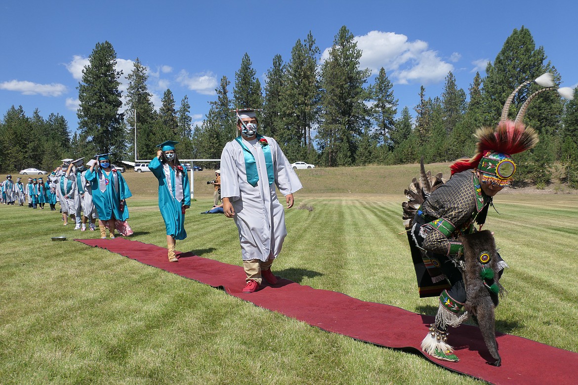 Two Eagle Rivers seniors waited until the Shelter in Place order was lifted so they could graduate together in person August 22.