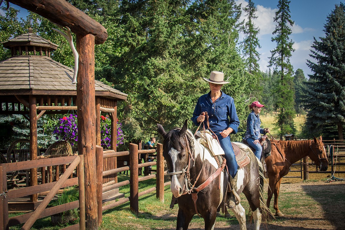 Guests ride horses at Flathead Lake Lodge. (Courtesy photo)