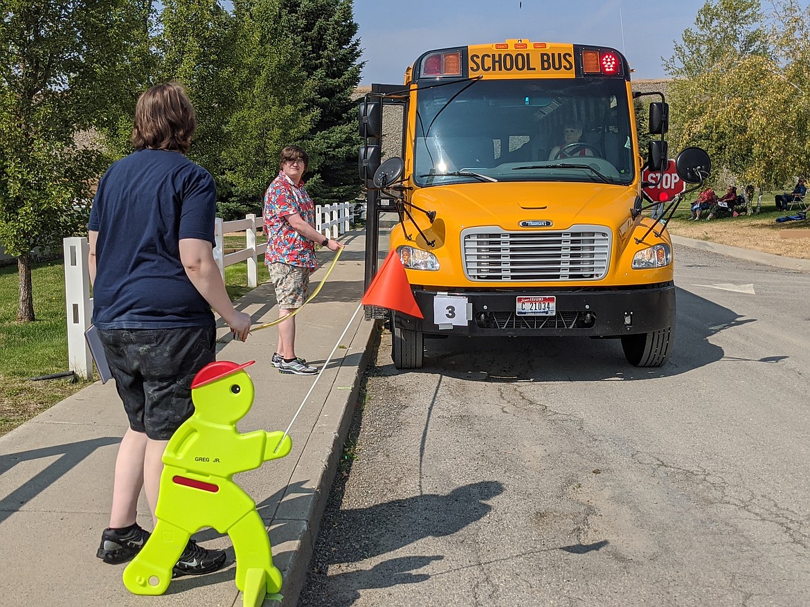 Bus driver Melanie Jansen comes to a stop at the first challenge on the course.