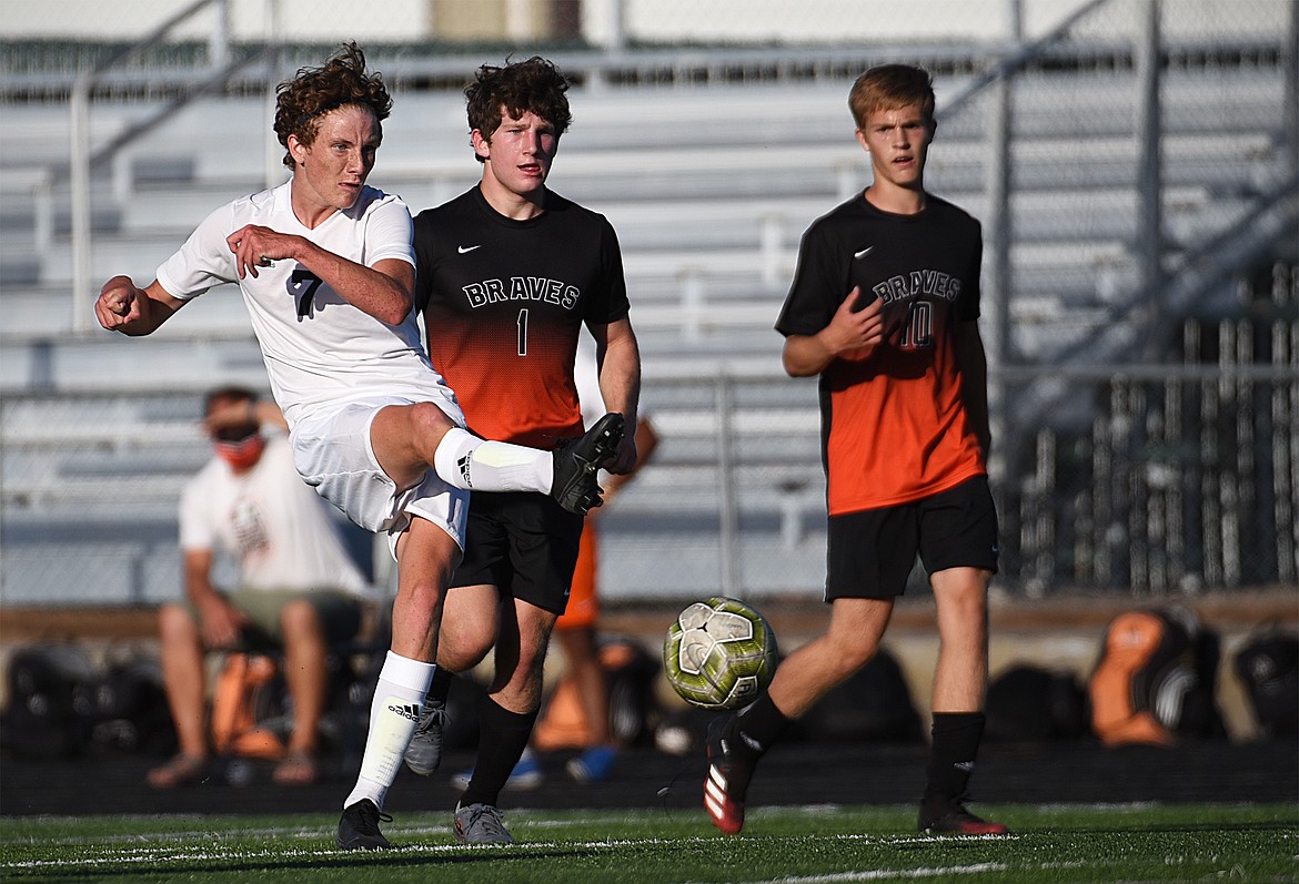 Glacier’s Sullivan Coggins (7) scores a first half goal against Flathead during crosstown soccer at Legends Stadium on Thursday. (Casey Kreider/Daily Inter Lake)