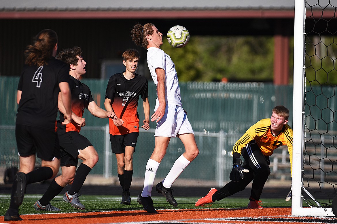 Glacier’s Sullivan Coggins (7) scores a first half goal off a rebound against Flathead during crosstown soccer at Legends Stadium on Thursday. (Casey Kreider/Daily Inter Lake)