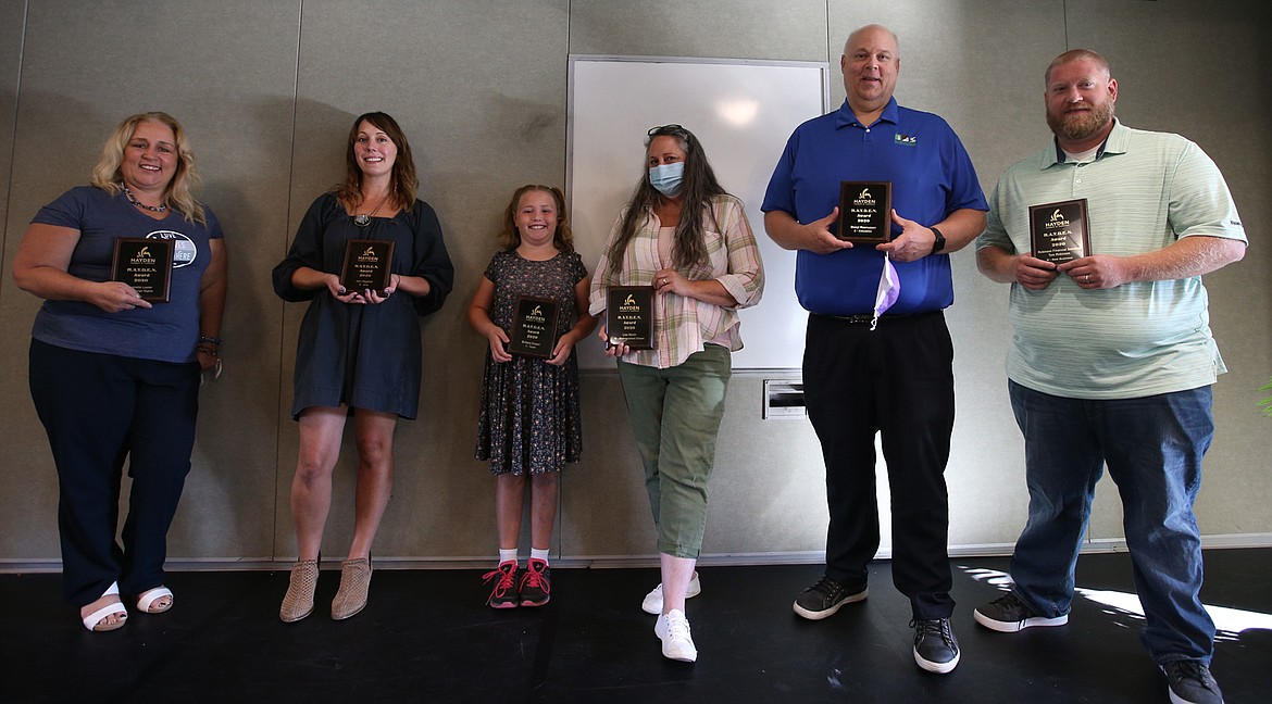 Winners at the Hayden Chamber of Commerce awards breakfast on Thursday, from left, are Jeanette Laster, Jeni Hegsted, Brittany Cooper, Lisa Martin, Rick Rasmussen accepting for wife Sharyl Rasmussen, and Tom Robinson.