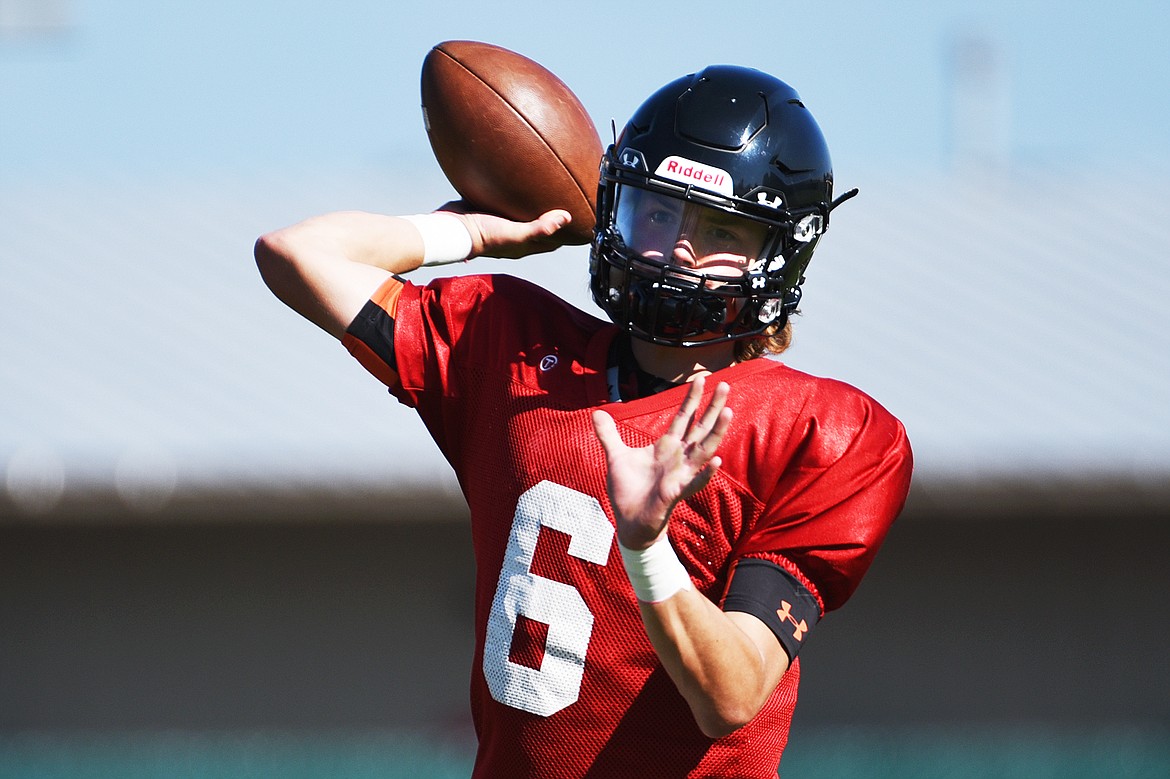 Flathead quarterback Charlie Hinchey throws to receivers at practice at Legends Stadium on Wednesday, Aug. 26. (Casey Kreider/Daily Inter Lake)