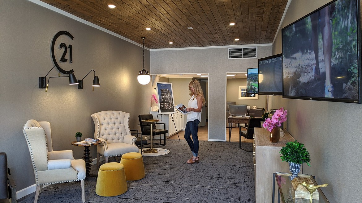 Ann Beutler is shown inside the new Century 21 location at 207-1/2 Sherman Ave. in downtown Coeur d'Alene.