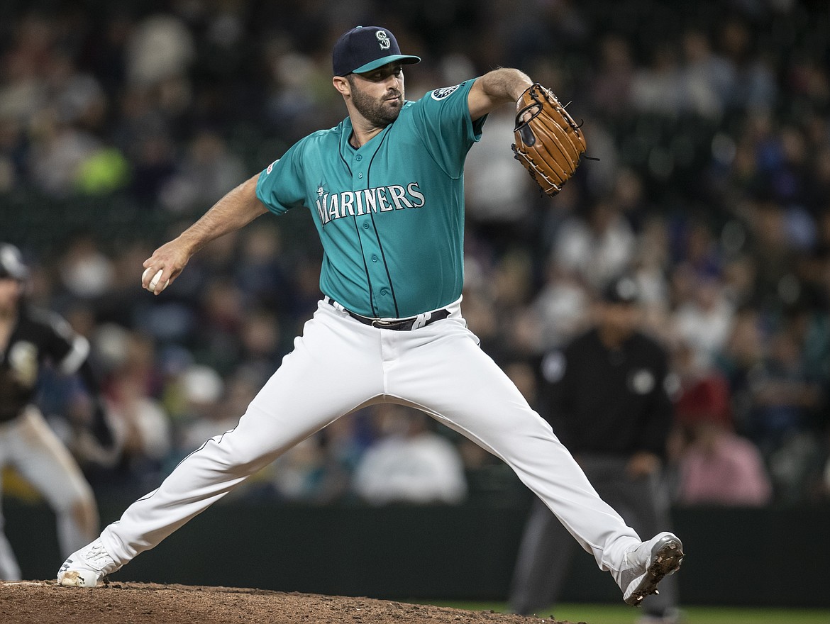 Seattle Mariners reliever Matt Magill delivers a pitch during a baseball game against the Chicago White Sox, Friday, Sept. 13, 2019, in Seattle. The White Sox won 9-7. (AP Photo/Stephen Brashear)