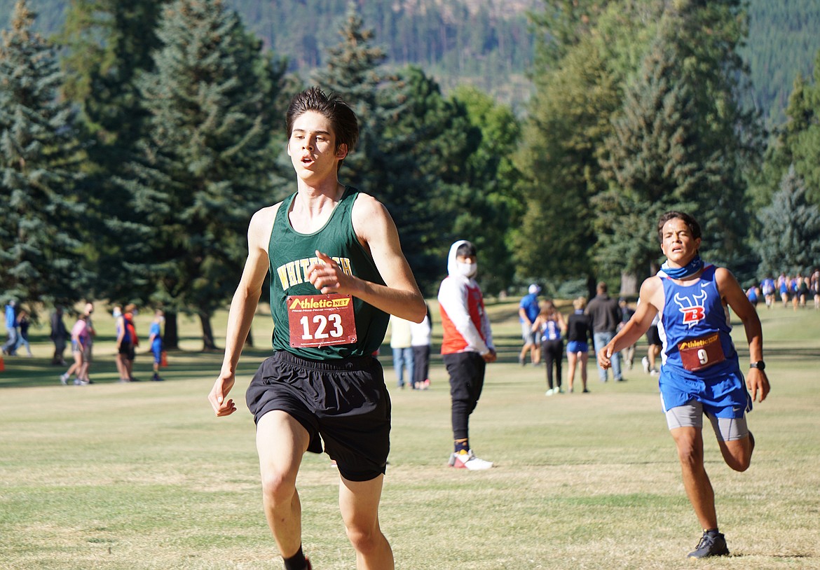 Whitefish’s Barrett Garcia runs at the Libby Invitational cross-country meet last weekend. (Matt Weller photo)