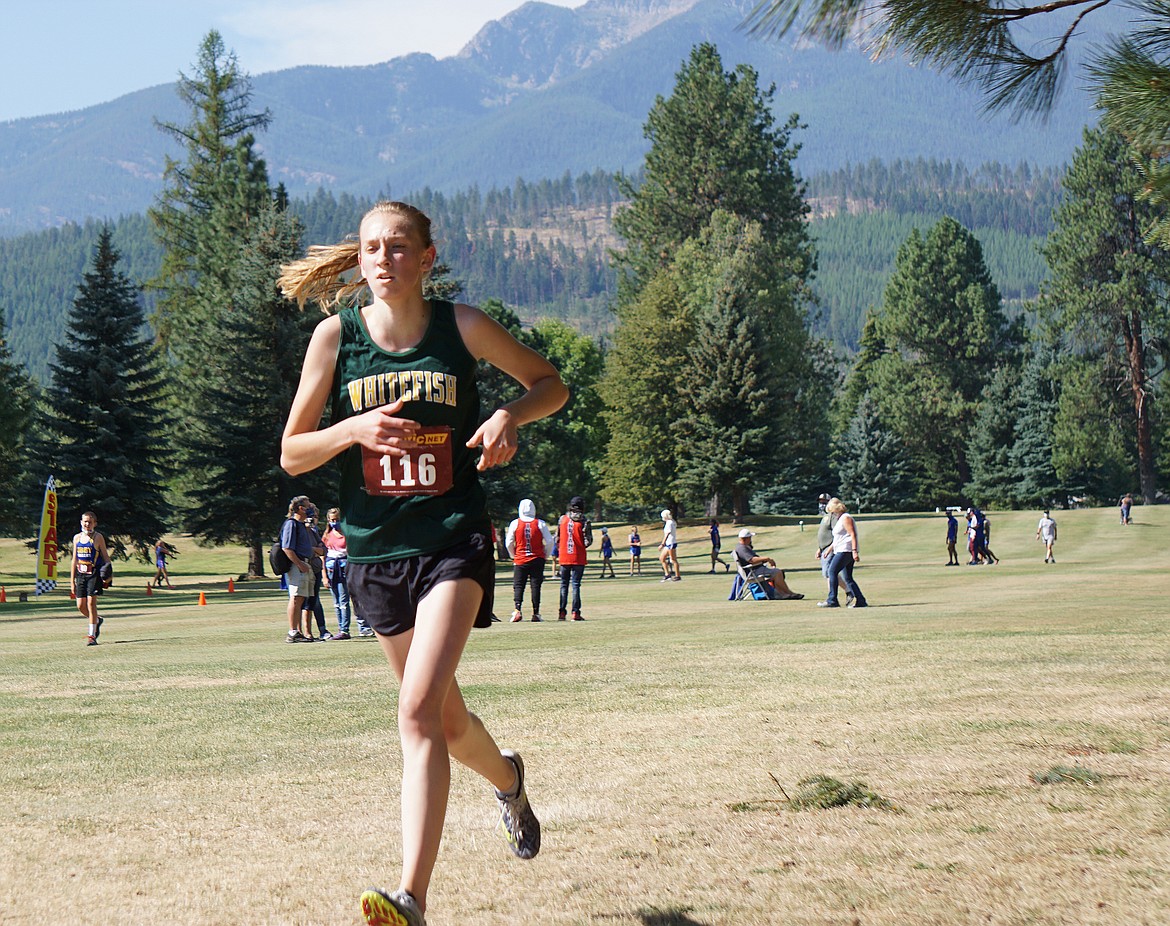 Whitefish’s Abby Priest runs at the Libby Invitational cross-country meet last weekend. (Matt Weller photo)