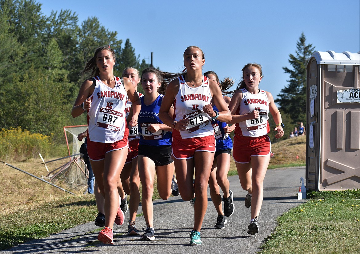 A pack of Sandpoint runners compete in Friday's meet.