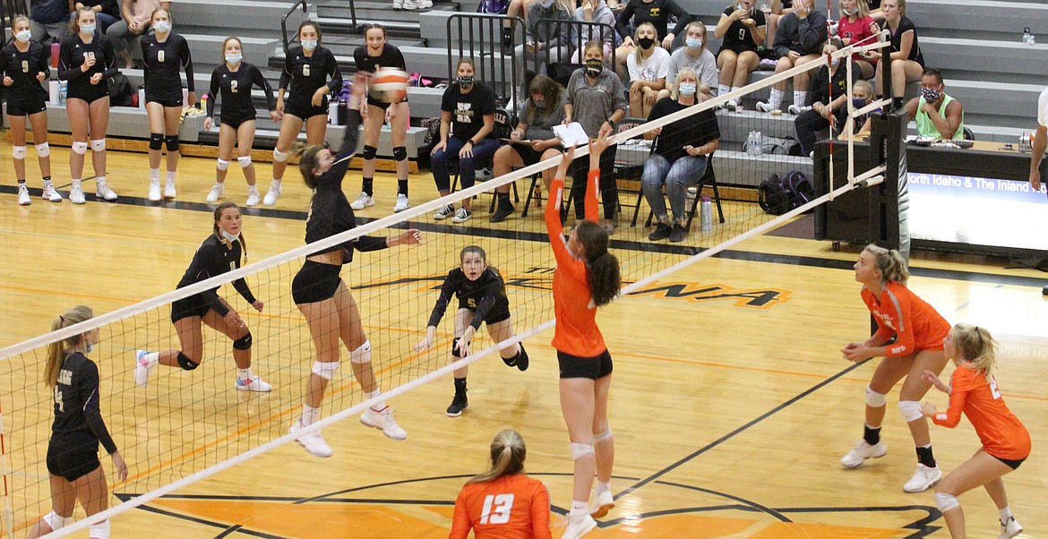 Wildcat Hailey Cheney crushes the ball during Kellogg's season opening match at Post Falls High School.