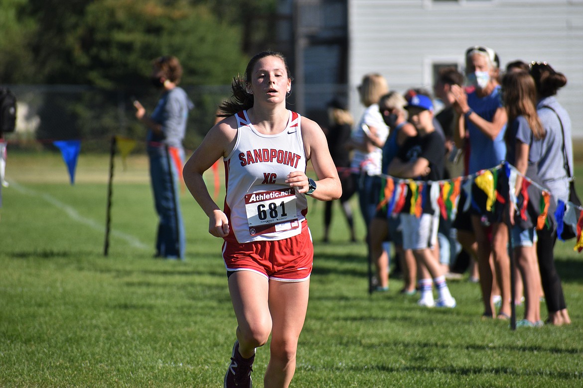 Senior captain Quinn Hooper pushes toward the finish of Friday's meet.