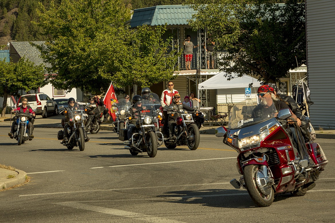 Participating bikers pull out of the Trail Motel in Kellogg on Saturday to start their round-trip ride throughout Shoshone County and Eastern Montana.