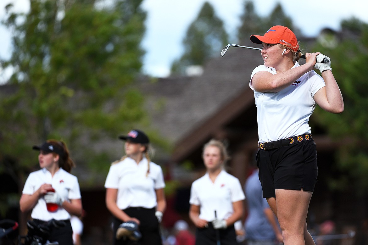 Flathead’s Marcella Mercer watches her tee shot during the Crosstown Cup at Buffalo Hill Golf Club on Tuesday. (Casey Kreider/Daily Inter Lake)