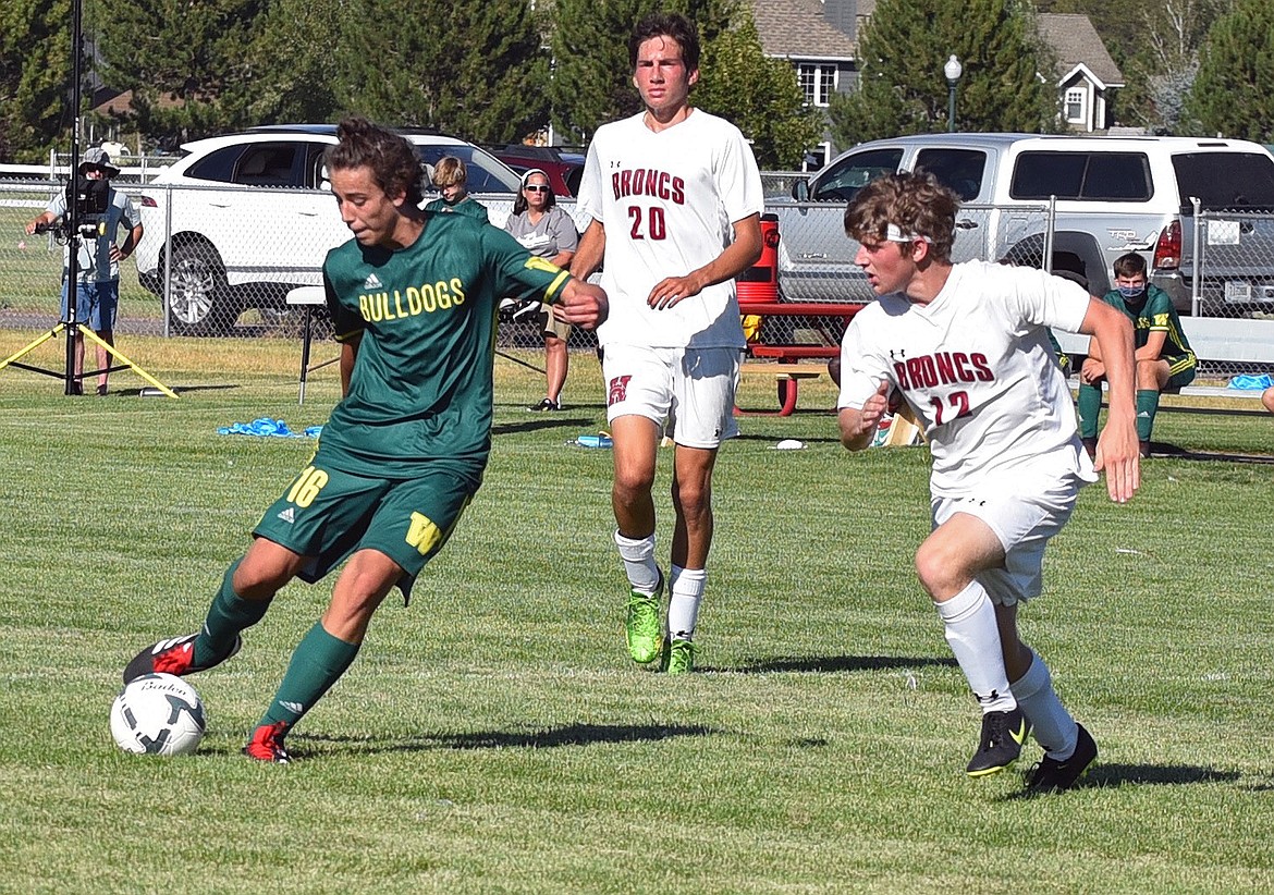 Whitefish junior midfielder Luke Roberts lines up a shot during the boys soccer 5-0 victory over Hamilton Friday afternoon at Smith Fields. (Whitney England/Whitefish Pilot)