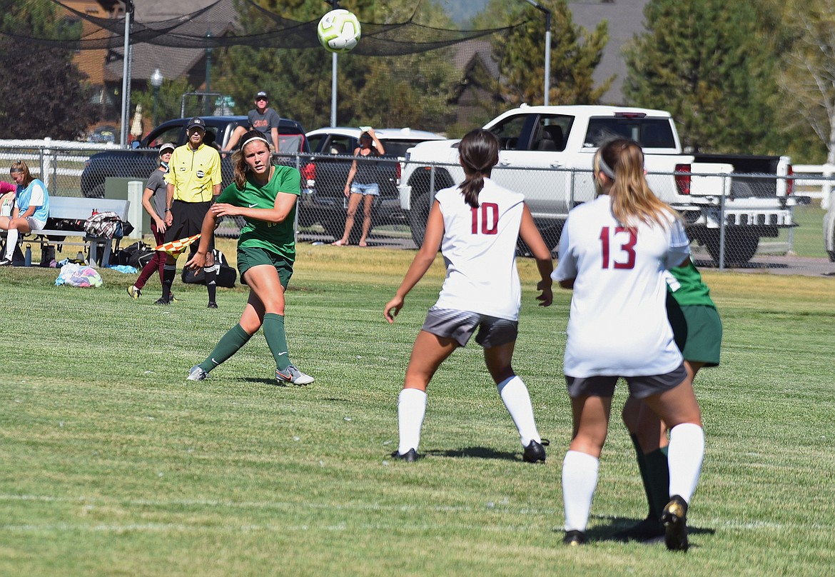 All-state central midfielder Emma Barron strikes a ball from outside the box in the second half of the game Friday, Aug. 28 at Smith Fields. Barron scored both second half goals to lift the Lady Bulldogs over Hamilton 3-1. (Whitney England/Whitefish Pilot)