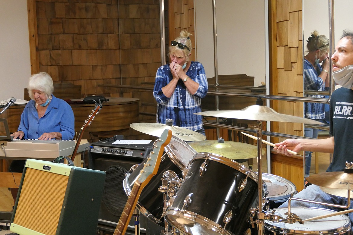 Co-op members perform at a jam session.