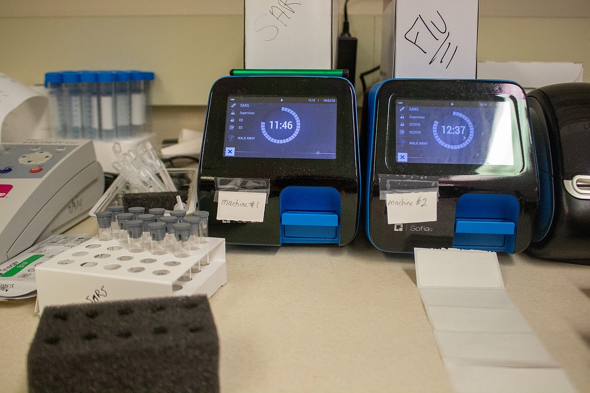 Cartridges loaded with samples from the antigen test are loaded into small, toaster-sized diagnostic tools called Sophia, produced by California-based healthcare manufacturer Quidel. After 15 minutes, the screen displays either a negative sign or a positive sign, depending on whether antigens were detected.