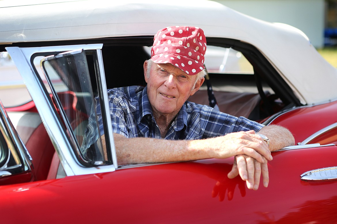 Art Olson, 87, of Evergreen is pictured inside his most prized vehicle, a 1958 Chevrolet Impala convertible. Olson searched for 20 years to find one that he could restore.