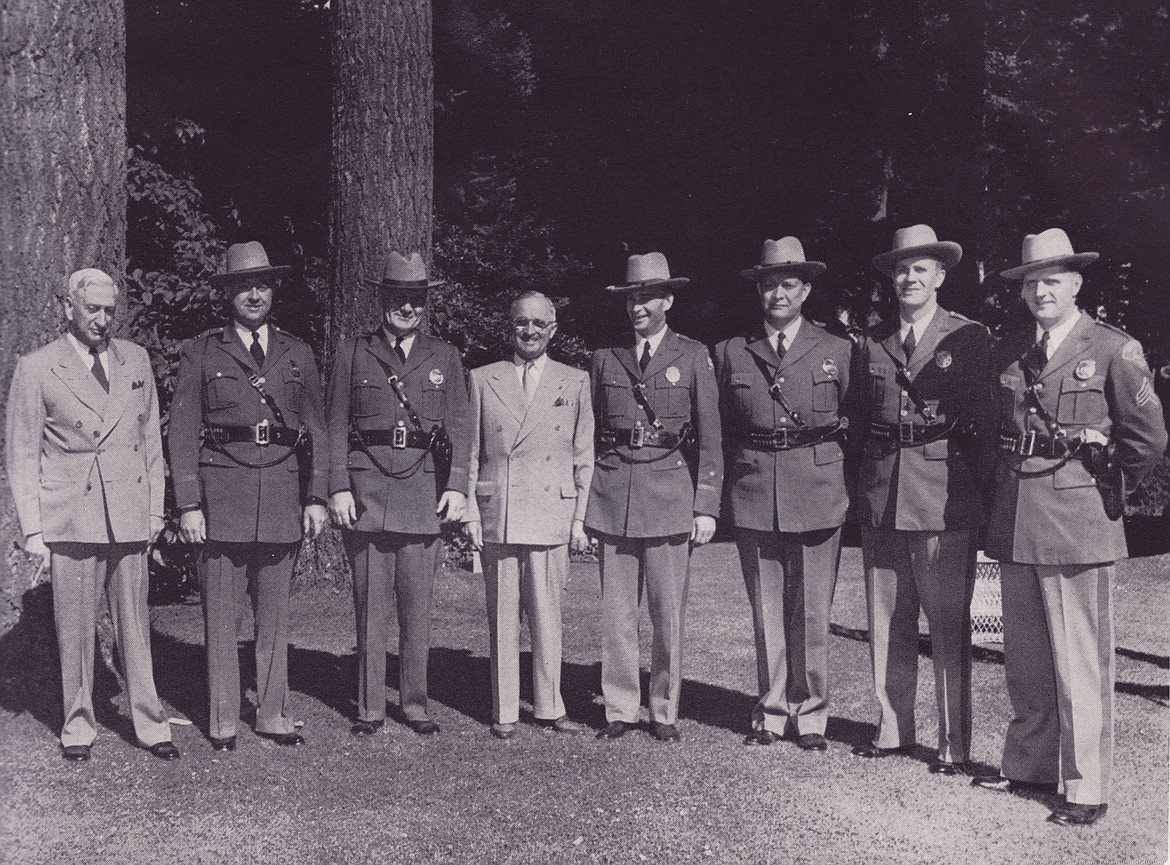 Former president Harry S. Truman pictured with members of the Washington State Patrol on a presidential visit in 1945.